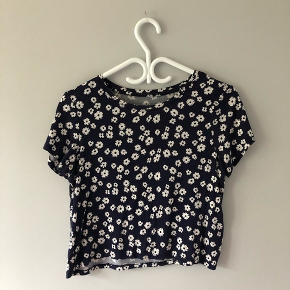 It is dark blue cropped floral t-shirt. - Picture 2 of 4